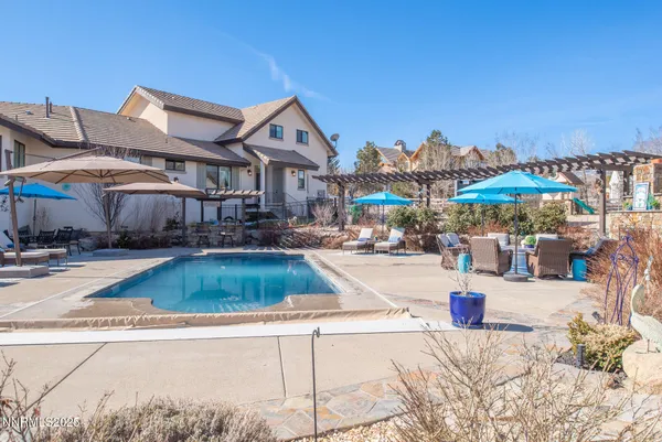 a view of a house with swimming pool