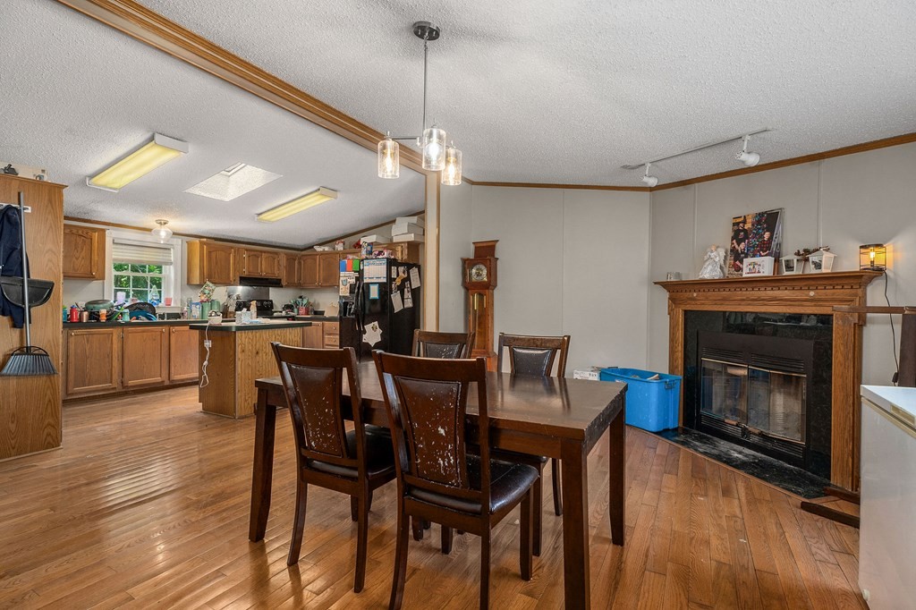 431 Mohawk Valley Road Monroe, TN 38573 - Photo 12 of 28 a view of a dining room with furniture and wooden floor
