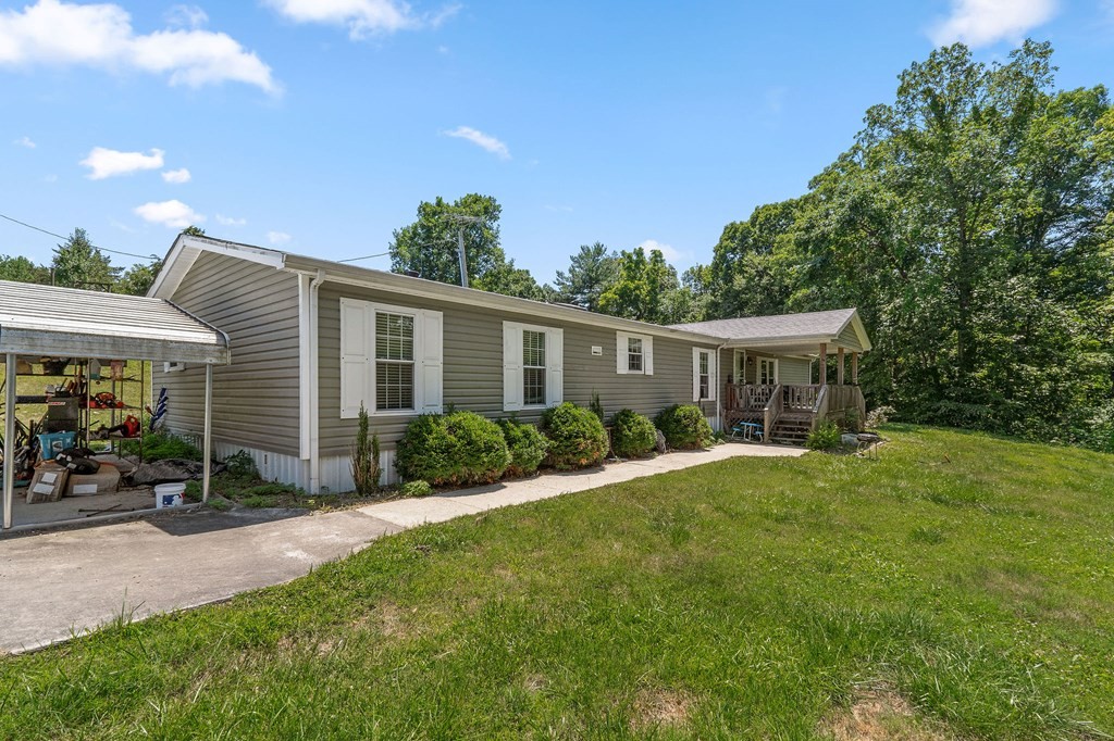 431 Mohawk Valley Road Monroe, TN 38573 - Photo 2 of 28 a front view of house with yard and green space