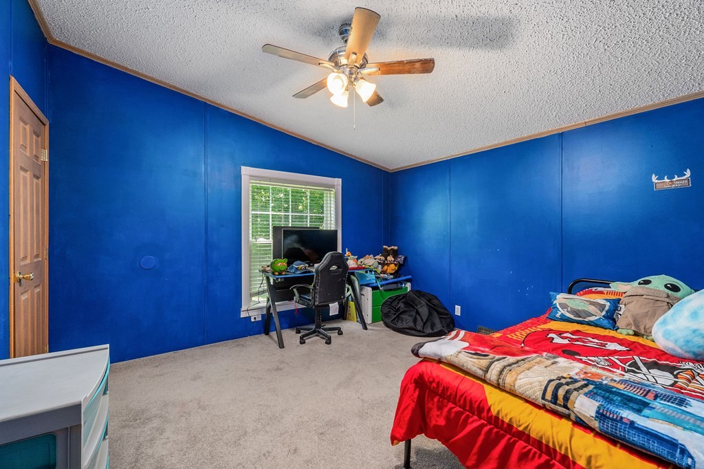 431 Mohawk Valley Road Monroe, TN 38573 - Photo 24 of 28 a bedroom with bed and a window