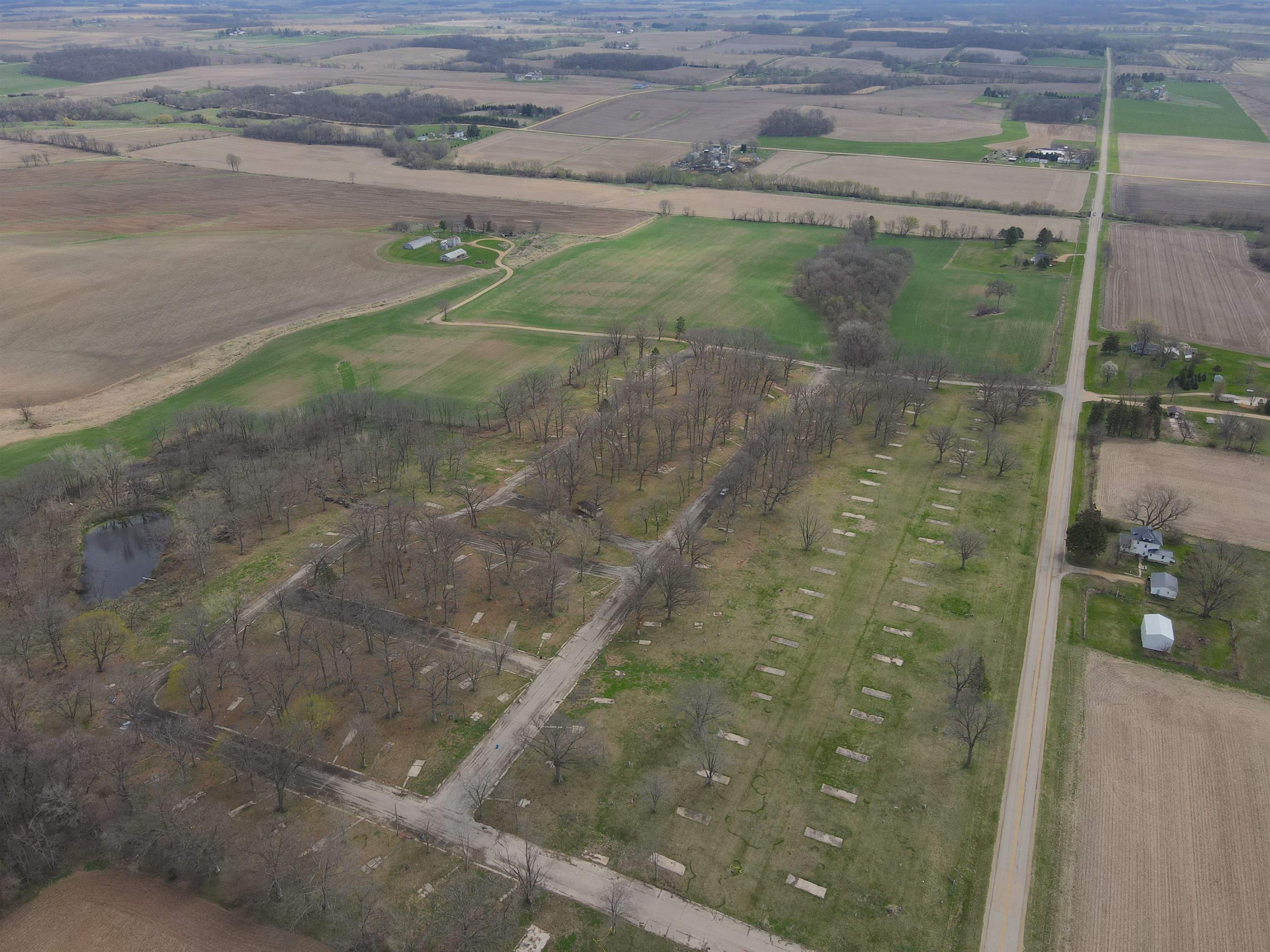 4500 East River Road Ridott, IL 61067 - Photo 13 of 54 a view of a small pond