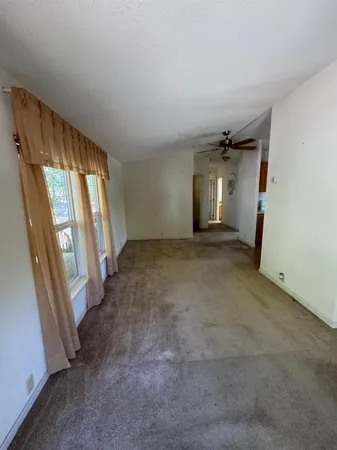an empty room with windows