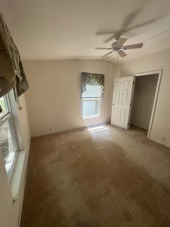 a view of a livingroom with a staircase
