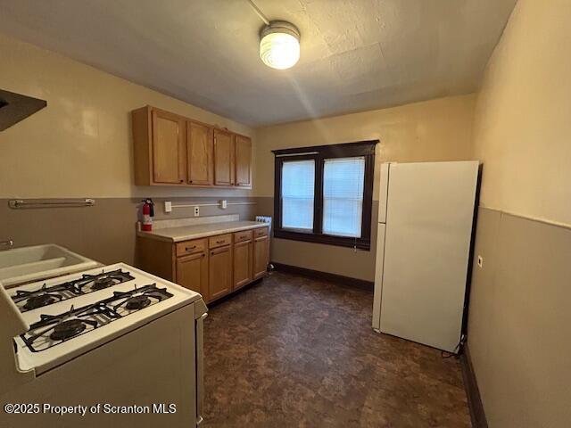 610 Moosic Street, Unit 2 Scranton, PA 18505 - Photo 16 of 18 a kitchen with a stove and a refrigerator