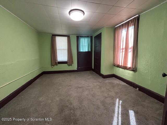 610 Moosic Street, Unit 2 Scranton, PA 18505 - Photo 5 of 18 an empty room with windows