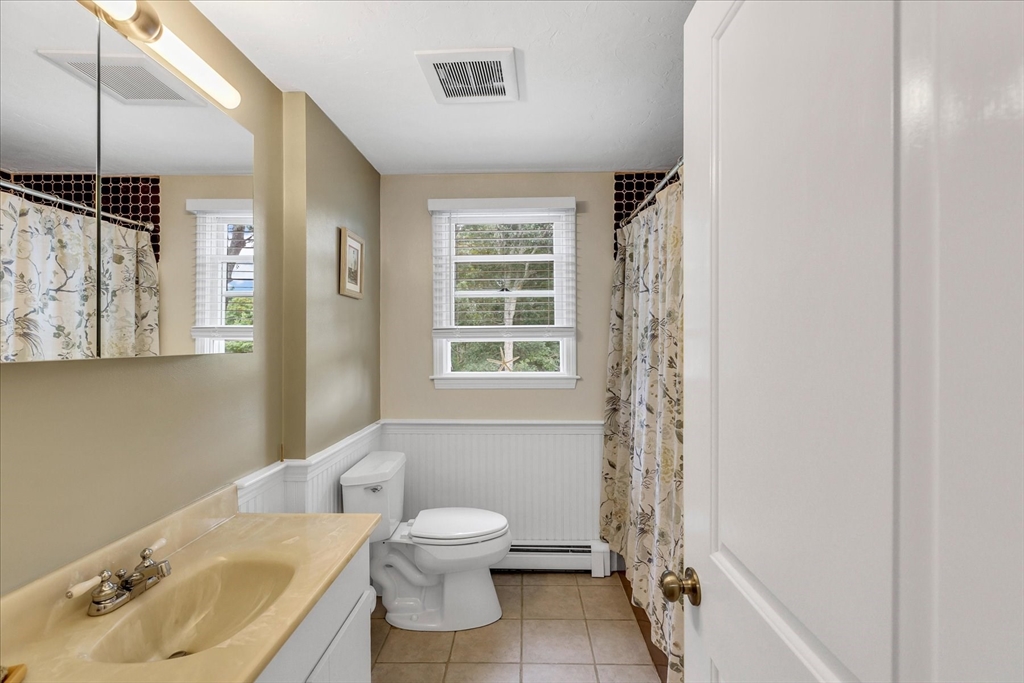 1 Sandy Lane Bourne, MA 02532 - Photo 11 of 37 a bathroom with a sink toilet and shower
