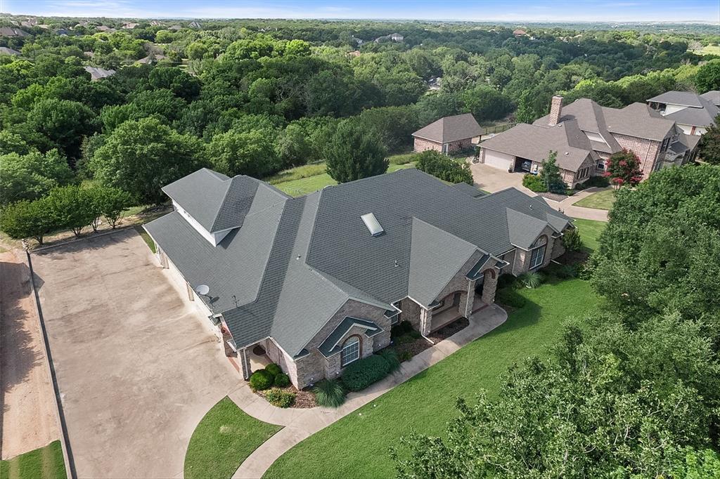 128 Rim Rock Road Aledo, TX 76008 - Photo 5 of 40 4 car garage with extra parking.