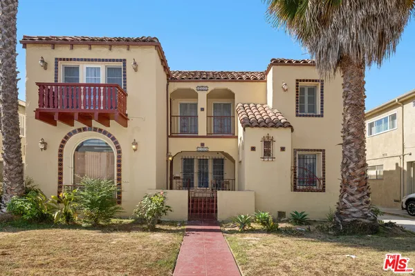 a front view of a house with yard