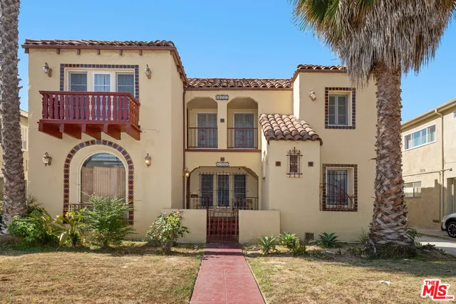 a front view of a house with yard