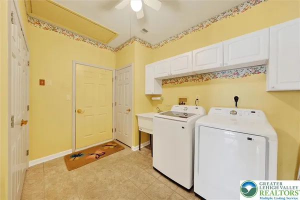 a view of utility room with washer and dryer