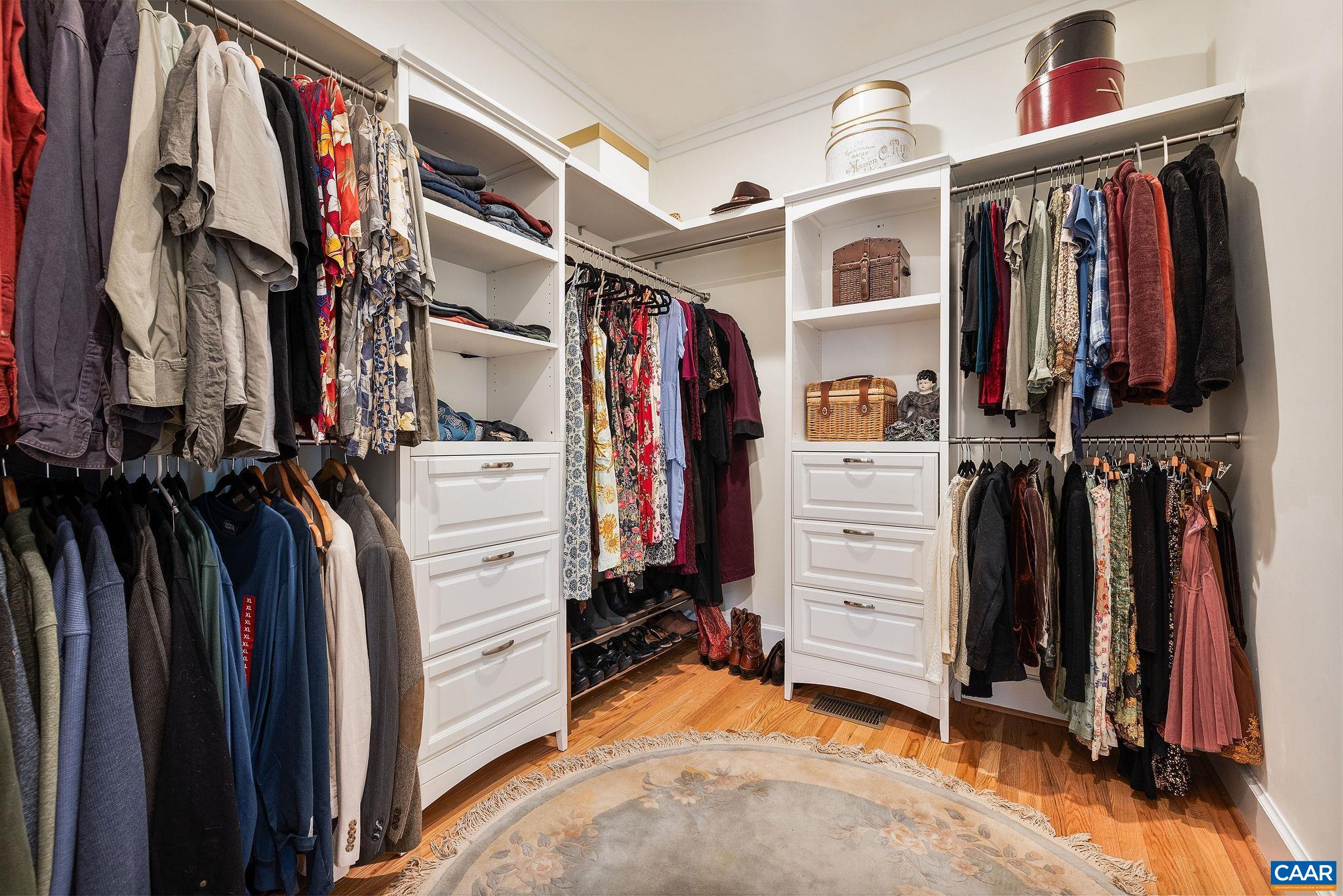 4764 Advance Mills Road Earlysville, VA 22936 - Photo 52 of 72 a view of walk in closet with clothes and shoes