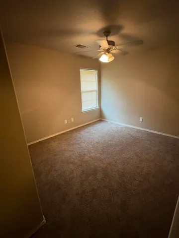 a view of a livingroom with a fan