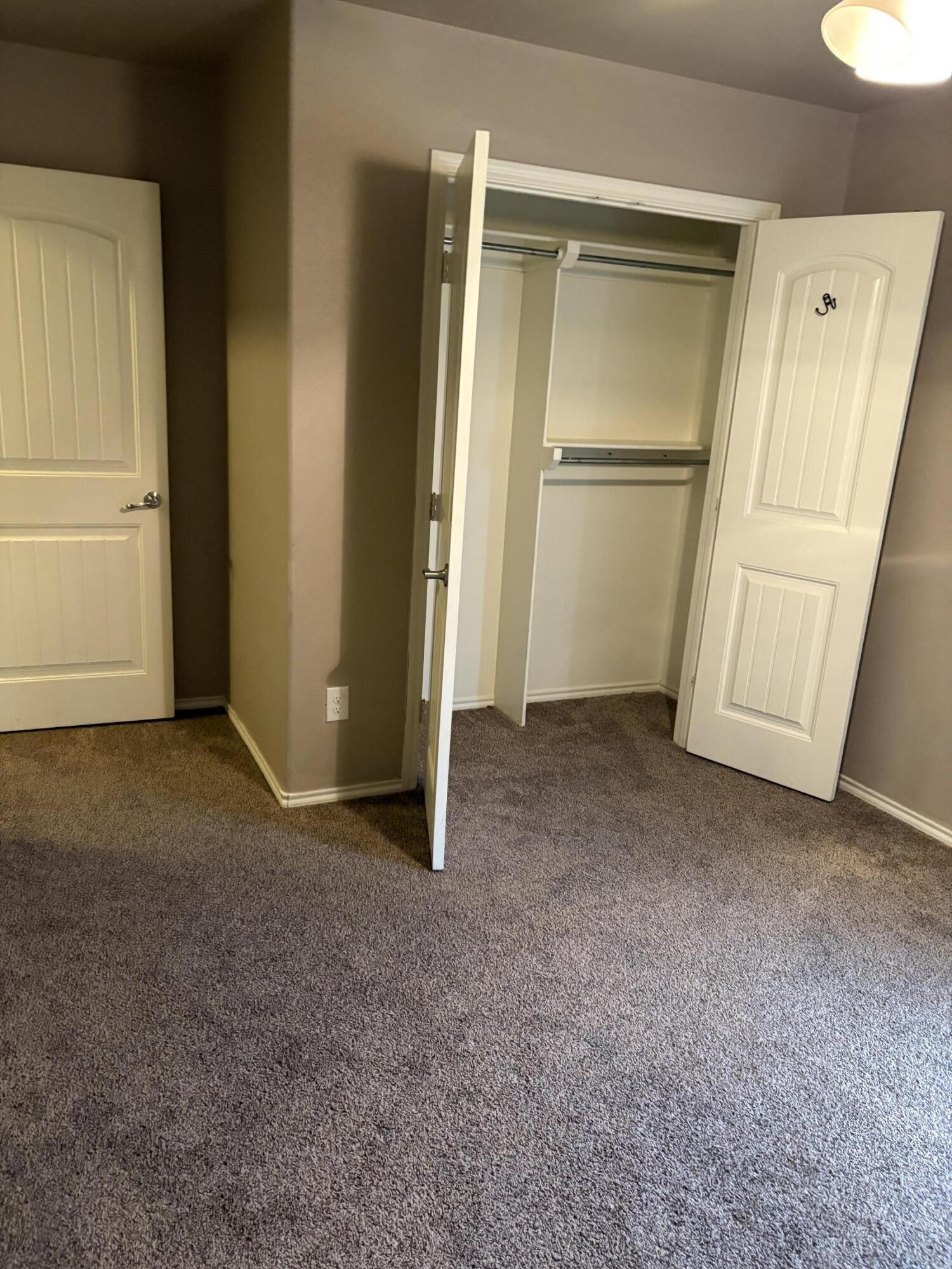 1236 Wheelock Street Lubbock, TX 79403 - Photo 16 of 17 an empty room with closet area