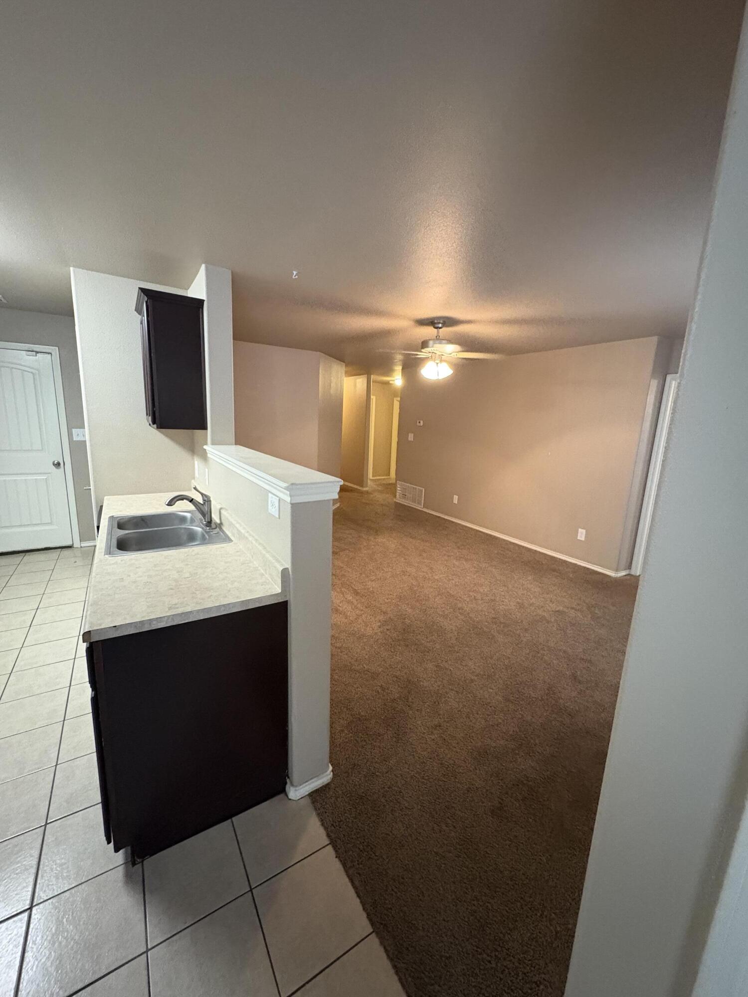 1236 Wheelock Street Lubbock, TX 79403 - Photo 3 of 17 a view of cupboard