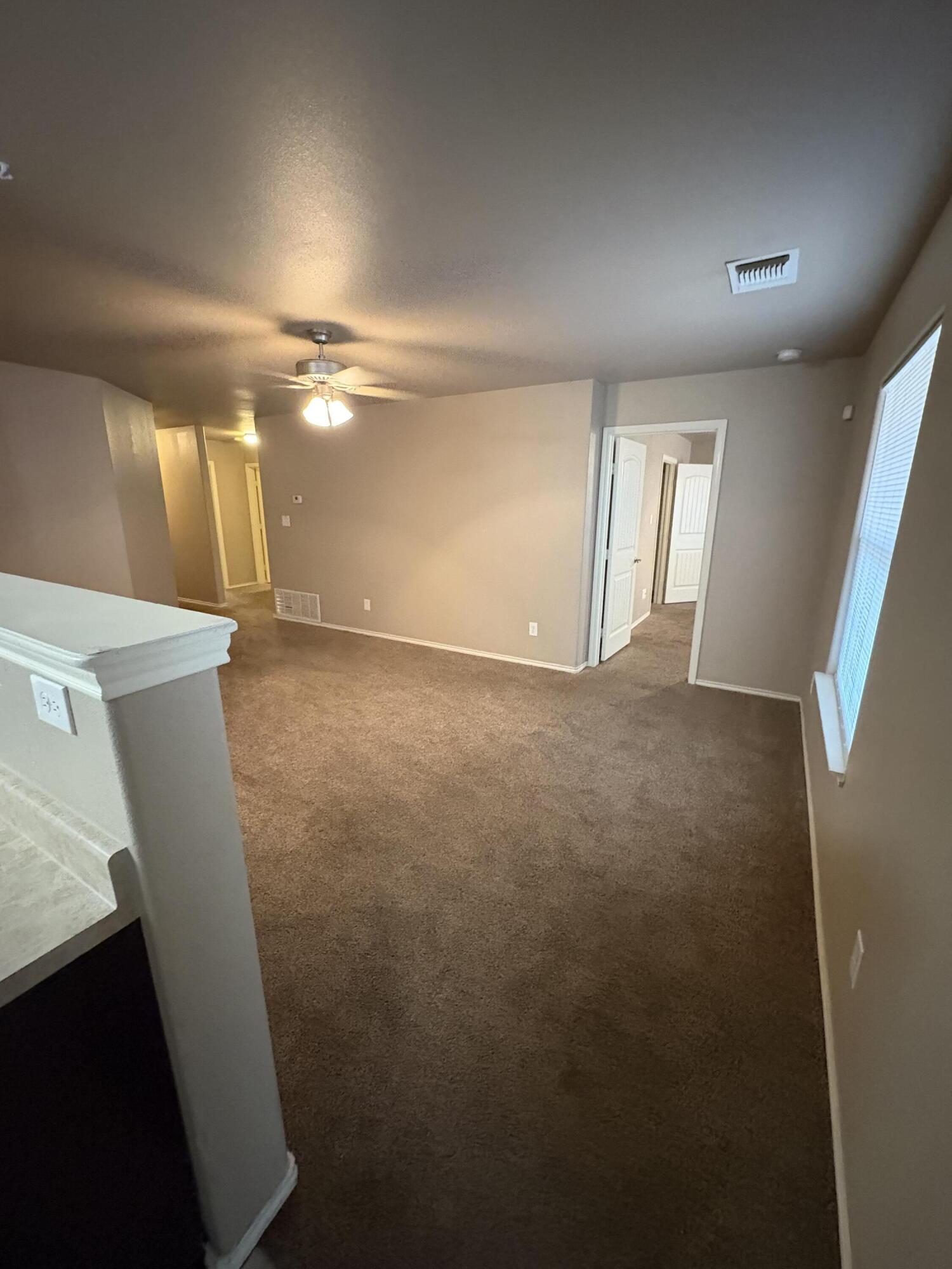 1236 Wheelock Street Lubbock, TX 79403 - Photo 5 of 17 a view of an empty room