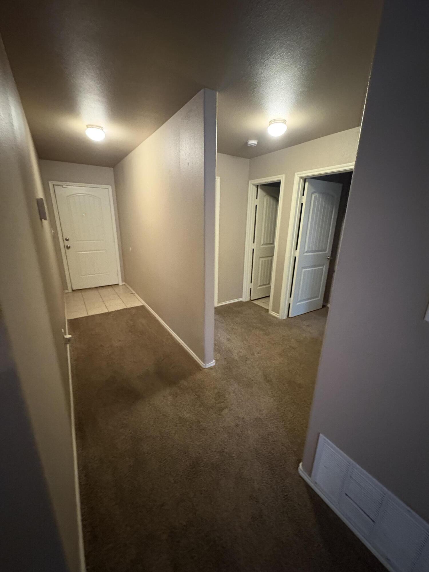 1236 Wheelock Street Lubbock, TX 79403 - Photo 10 of 17 a view of hallway with stairs