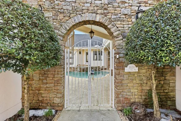 an aerial view of multiple houses with outdoor space