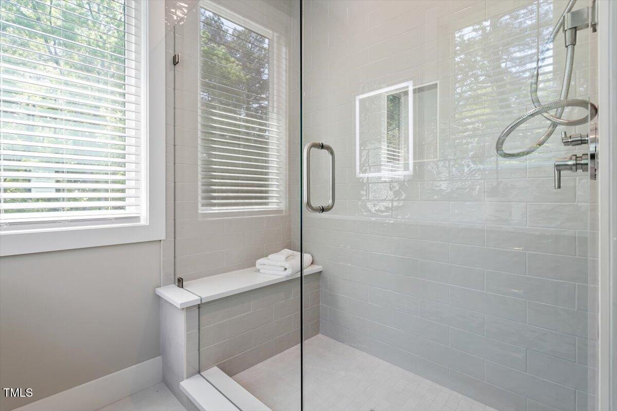 337 Merrywood Drive Raleigh, NC 27610 - Photo 24 of 52 a bathroom with a shower