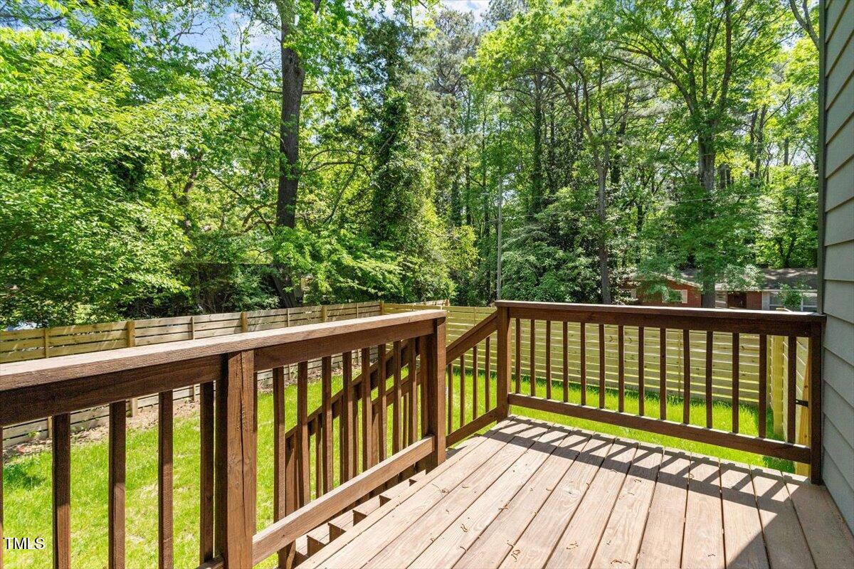 337 Merrywood Drive Raleigh, NC 27610 - Photo 41 of 52 a view of a wooden roof deck
