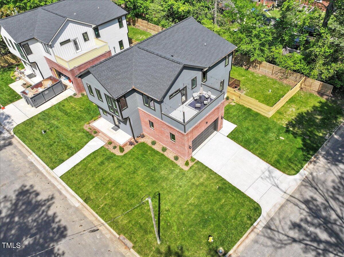 337 Merrywood Drive Raleigh, NC 27610 - Photo 43 of 52 an aerial view of a house with a yard