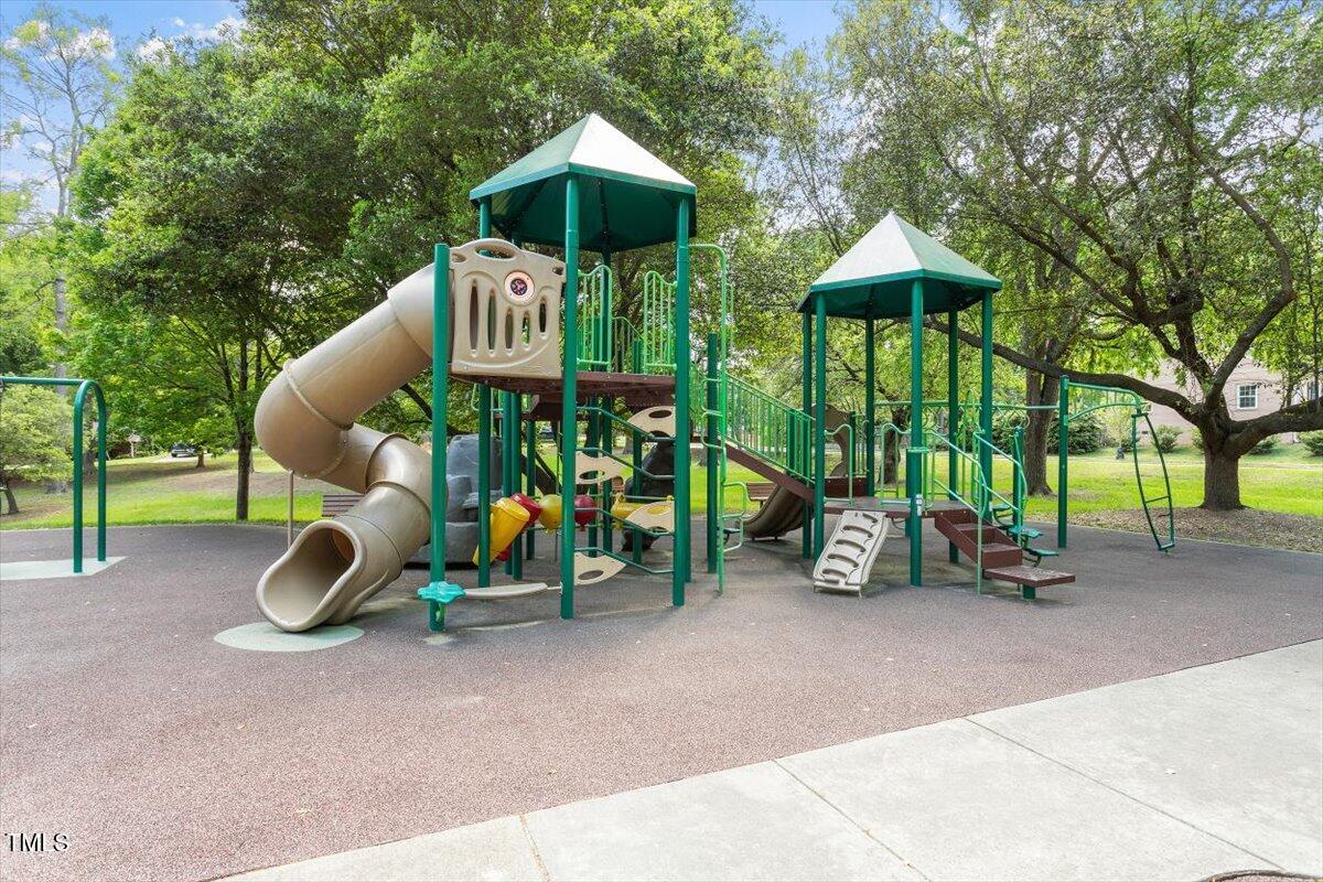 337 Merrywood Drive Raleigh, NC 27610 - Photo 48 of 52 a childrens park with lots of swings and slides