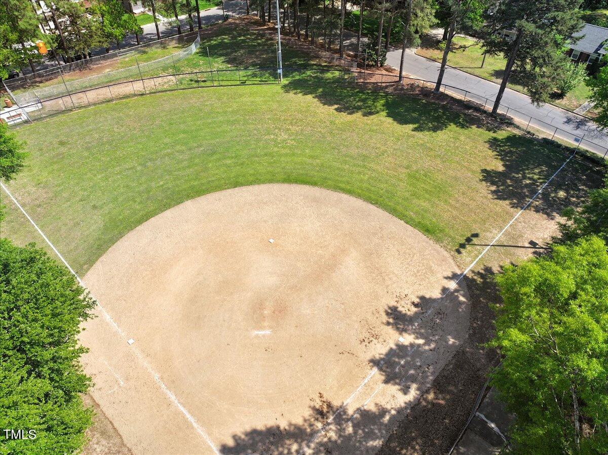 337 Merrywood Drive Raleigh, NC 27610 - Photo 50 of 52 a view of a swimming pool with a yard