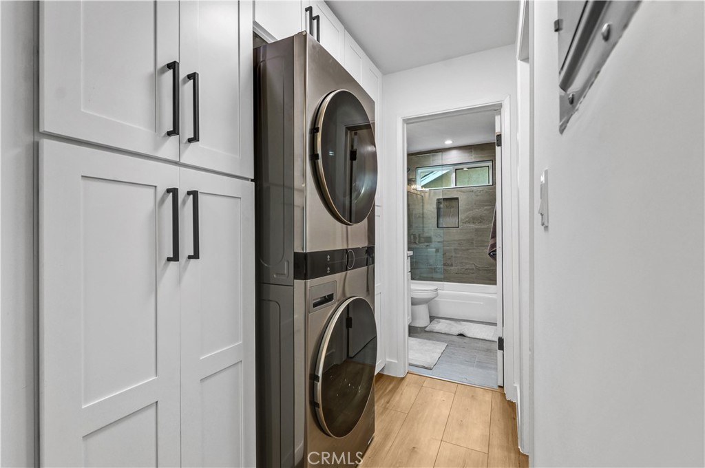 4354 Oakwood Avenue Los Angeles, CA 90004 - Photo 12 of 17 a utility room with dryer and washer
