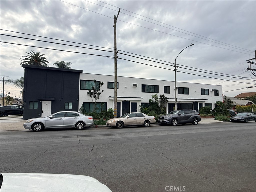 4354 Oakwood Avenue Los Angeles, CA 90004 - Photo 17 of 17 a view of a cars parked in front of a building