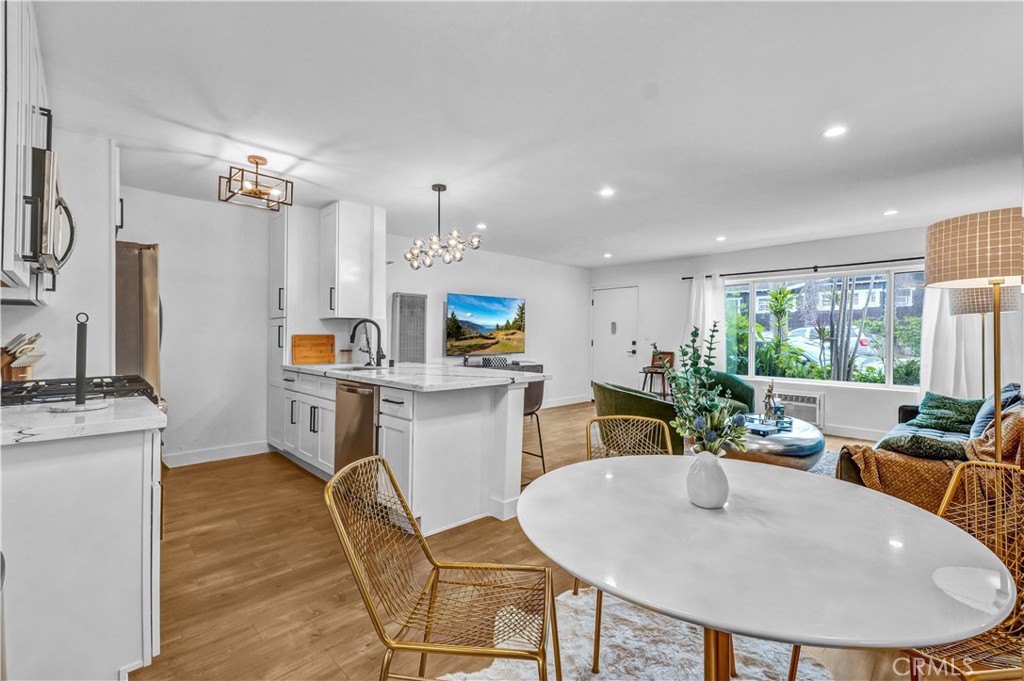 4354 Oakwood Avenue Los Angeles, CA 90004 - Photo 8 of 17 a view of a dining room with furniture
