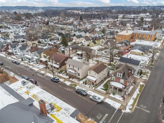 an aerial view of a city with lots of residential buildings