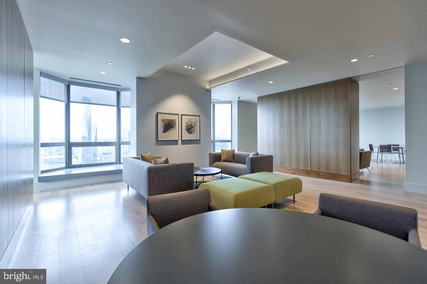 2020 Walnut Street, Unit 10A Philadelphia, PA 19103 - Photo 9 of 15 a living room with furniture and a large window