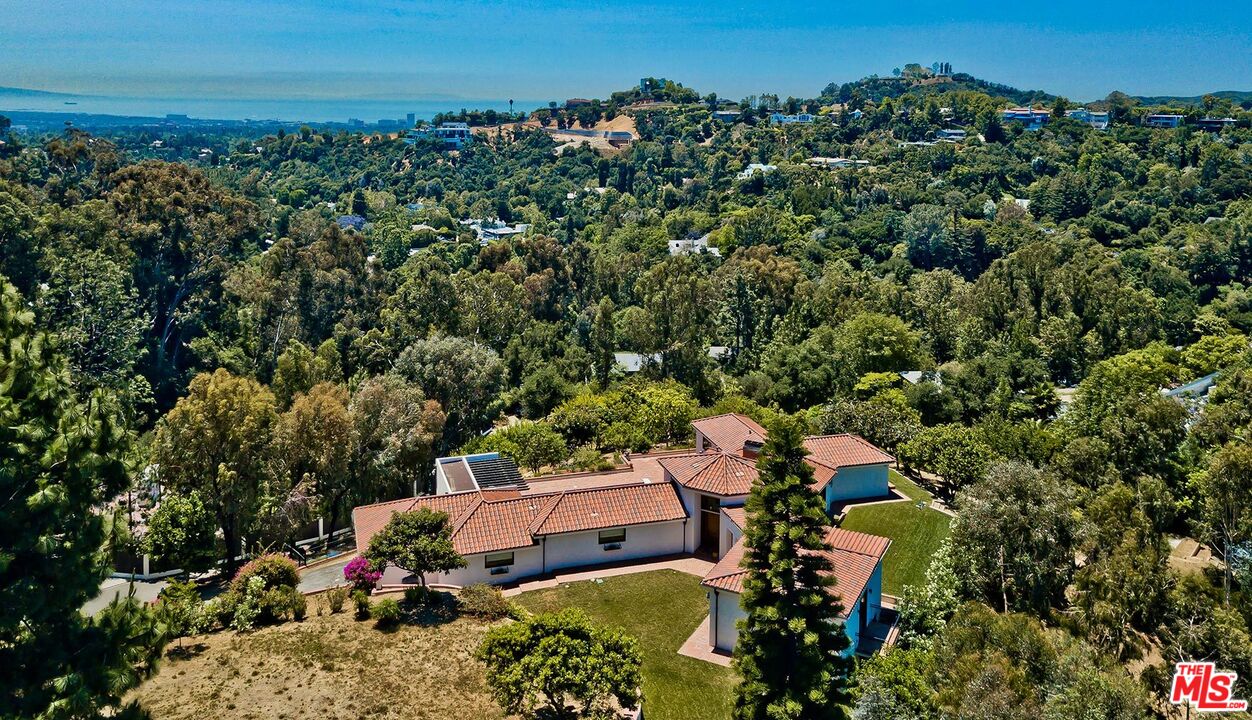 13146 Rivers Road Los Angeles, CA 90049 - Photo 29 of 38 an aerial view of a house with a yard