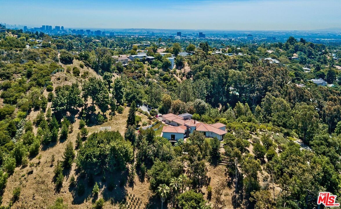 13146 Rivers Road Los Angeles, CA 90049 - Photo 30 of 38 an aerial view of a houses with a yard