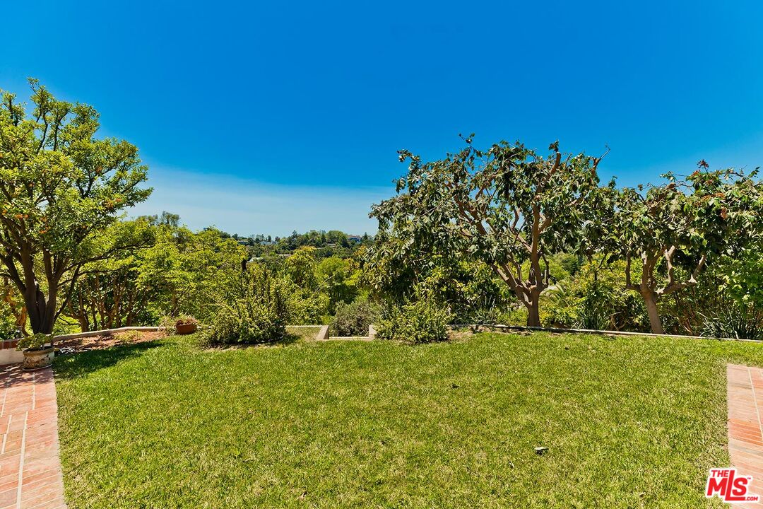 13146 Rivers Road Los Angeles, CA 90049 - Photo 35 of 38 a view of a field with an trees