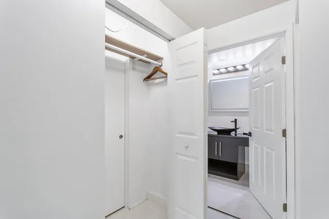 a view of a kitchen with a sink
