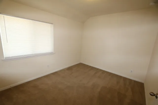 an empty room with a window