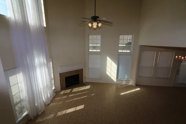 an empty room with windows