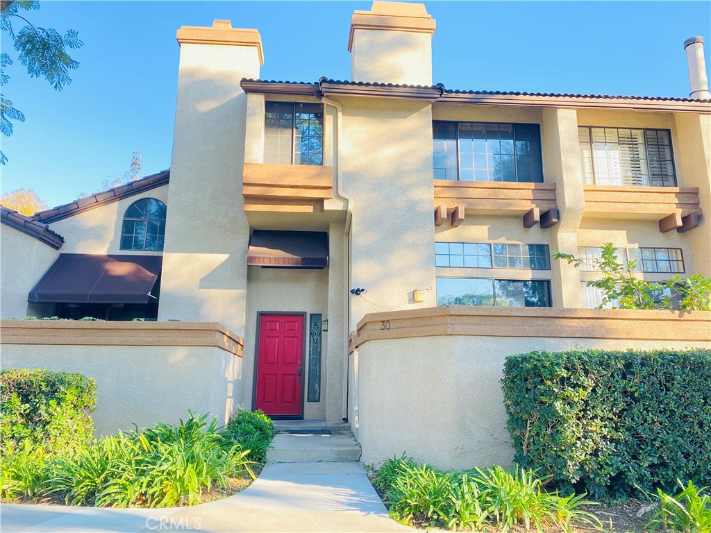 30 Mountain Shadows Place Pomona, CA 91766 - Photo 1 of 23 front view of a house with a yard