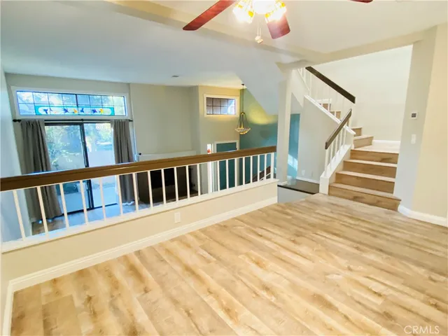 a view of staircase with black and white walls