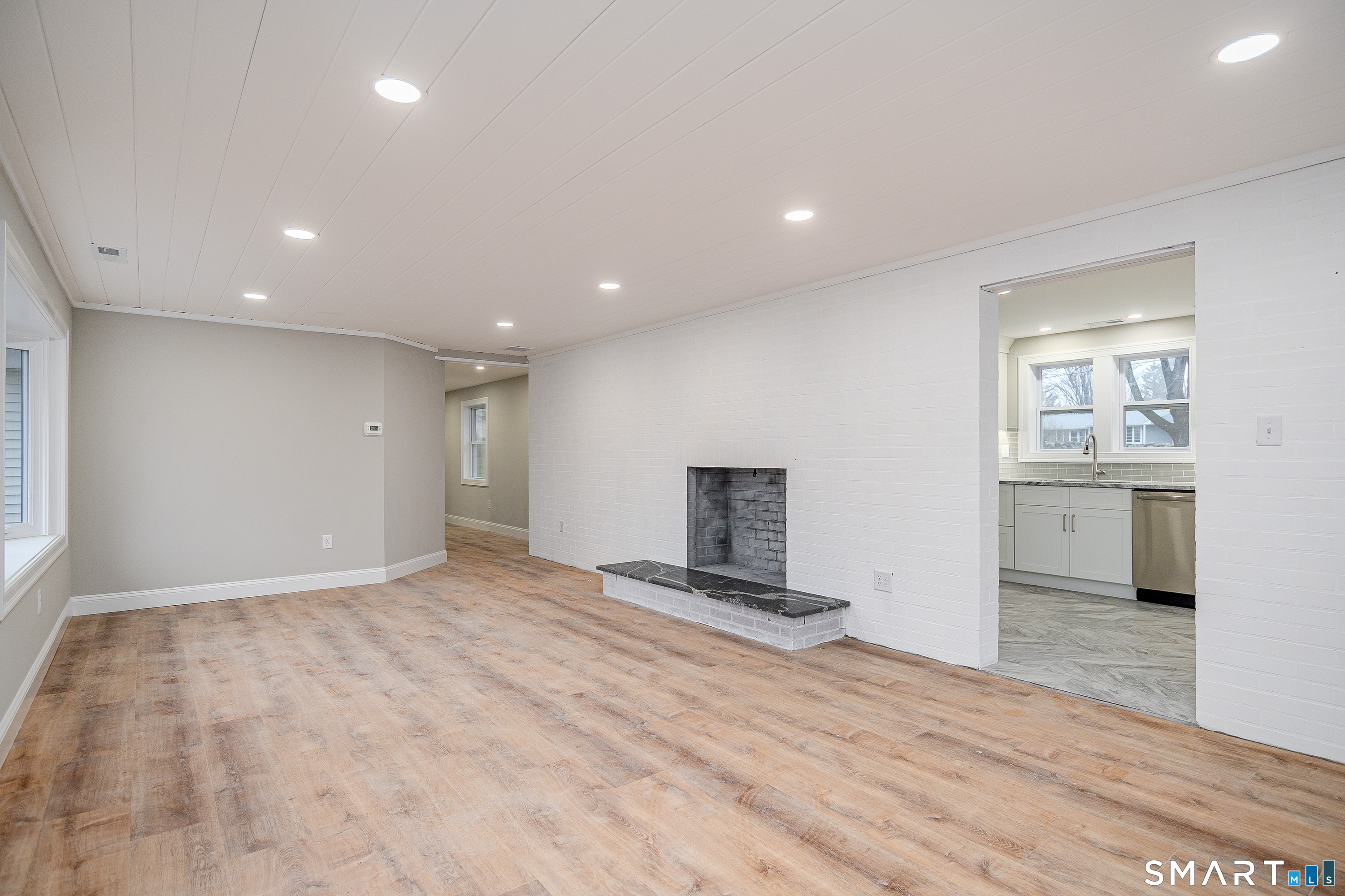 284 Chestnut Tree Hill Road Oxford, CT 06478 - Photo 11 of 34 a view of a kitchen with a sink and a stove