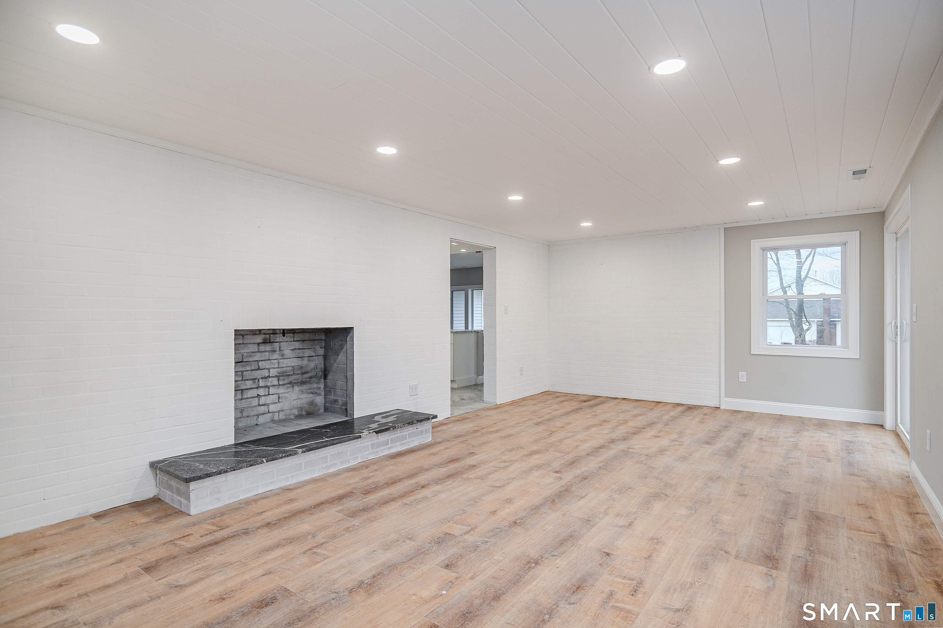 284 Chestnut Tree Hill Road Oxford, CT 06478 - Photo 13 of 34 a view of an empty room with a window