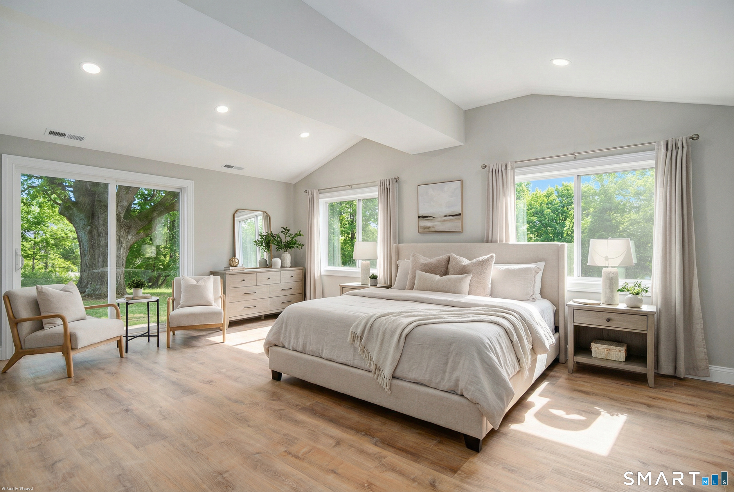 284 Chestnut Tree Hill Road Oxford, CT 06478 - Photo 24 of 34 a bedroom with a bed and large windows