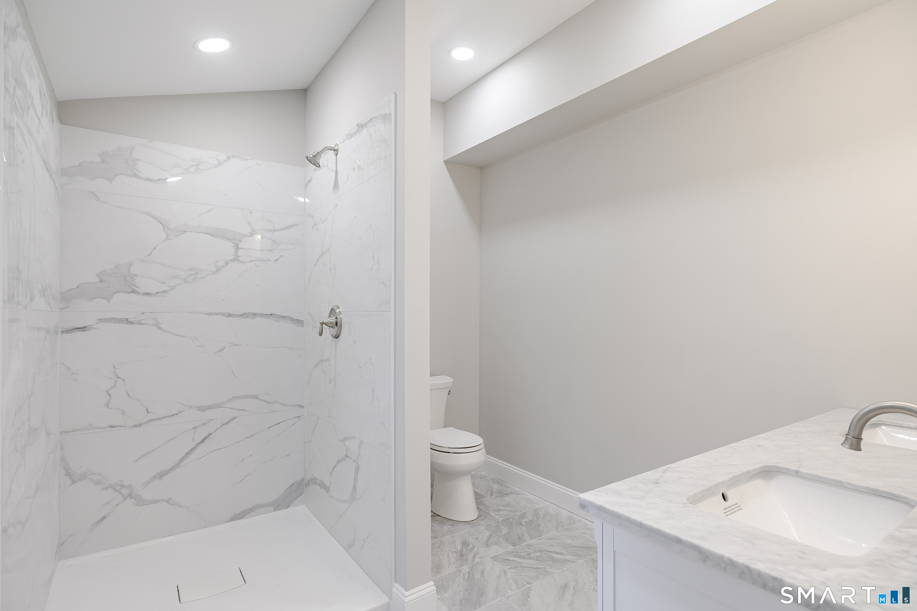 284 Chestnut Tree Hill Road Oxford, CT 06478 - Photo 25 of 34 a bathroom with a sink and toilet