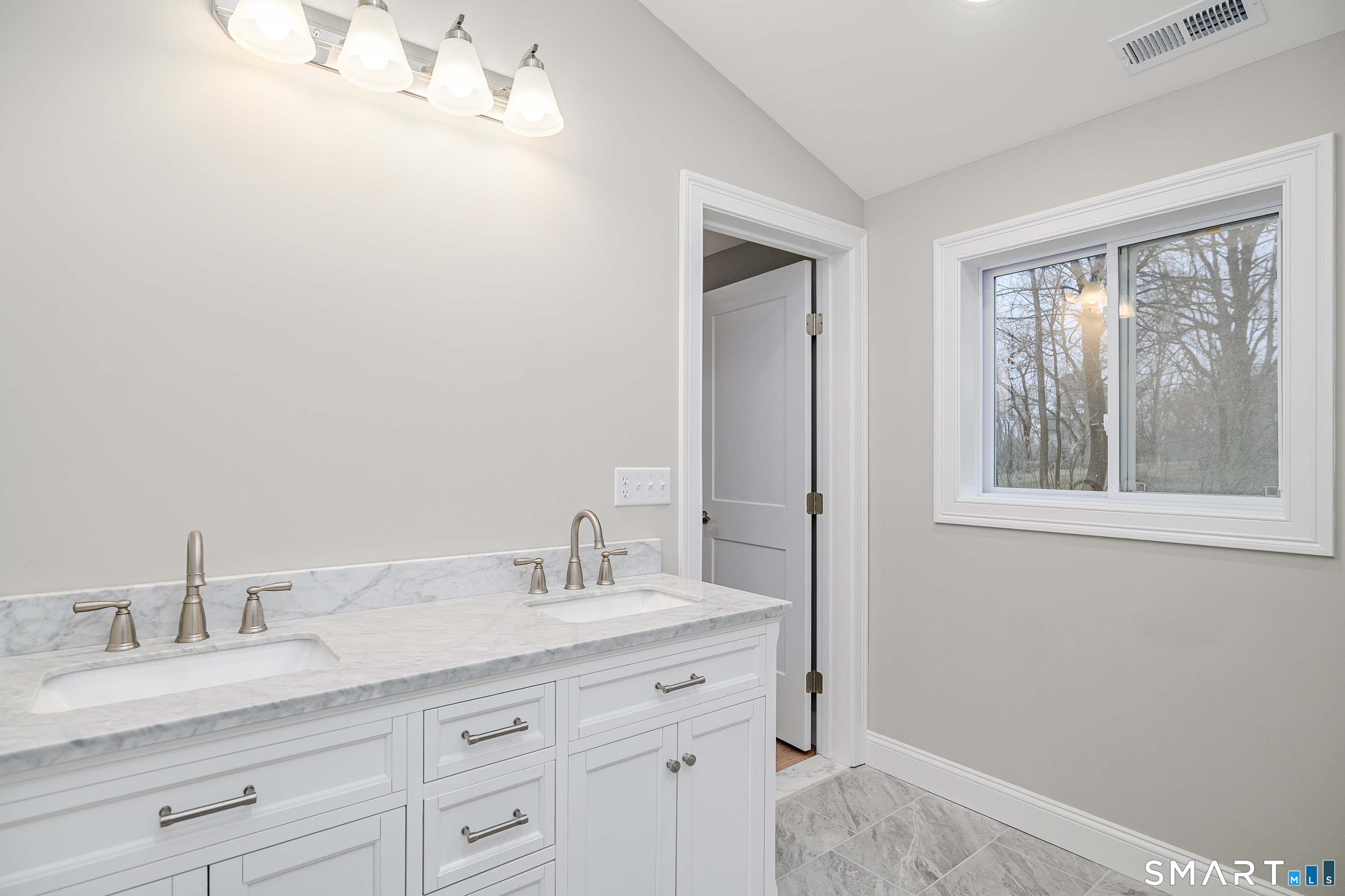 284 Chestnut Tree Hill Road Oxford, CT 06478 - Photo 26 of 34 a bathroom with a granite countertop sink mirror and cabinets