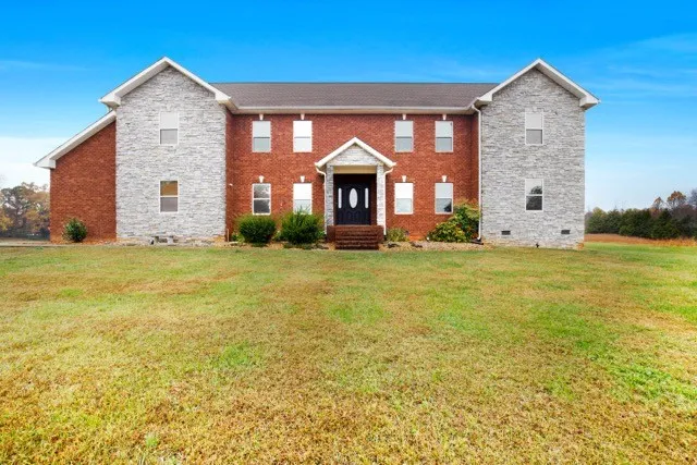 a house view with a outdoor space