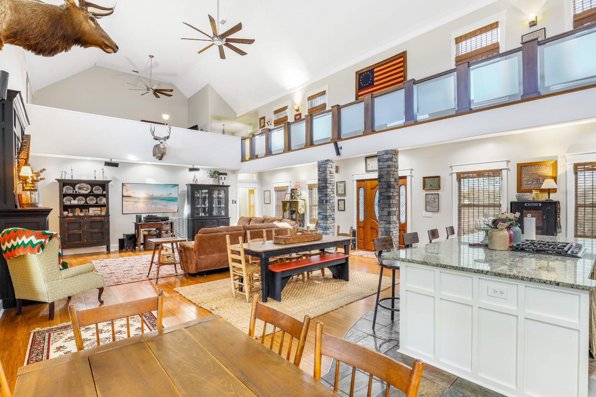 7518 Highway 49 Springfield, TN 37172 - Photo 12 of 35 a living room filled with lots of furniture and a chandelier