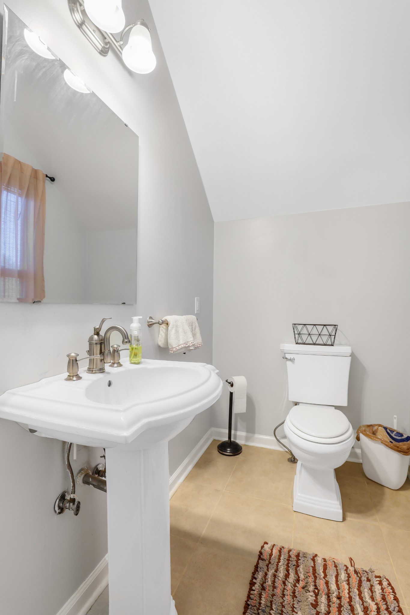 7518 Highway 49 Springfield, TN 37172 - Photo 18 of 35 a bathroom with a sink toilet and a mirror