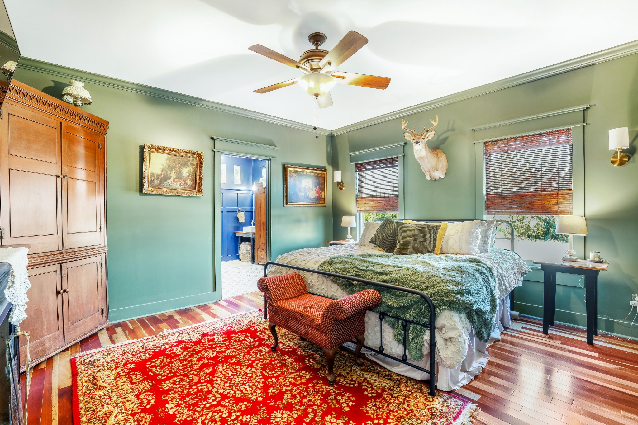 7518 Highway 49 Springfield, TN 37172 - Photo 25 of 35 a bedroom with a bed and a chandelier