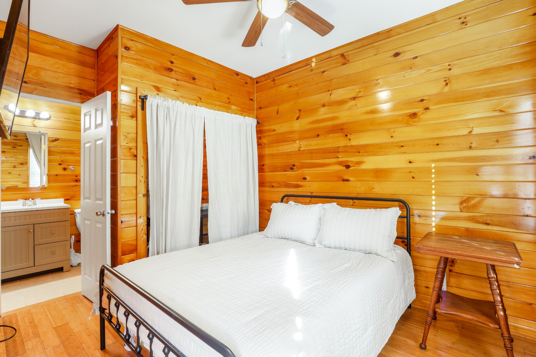 7518 Highway 49 Springfield, TN 37172 - Photo 31 of 35 a bedroom with a bed and wooden floor