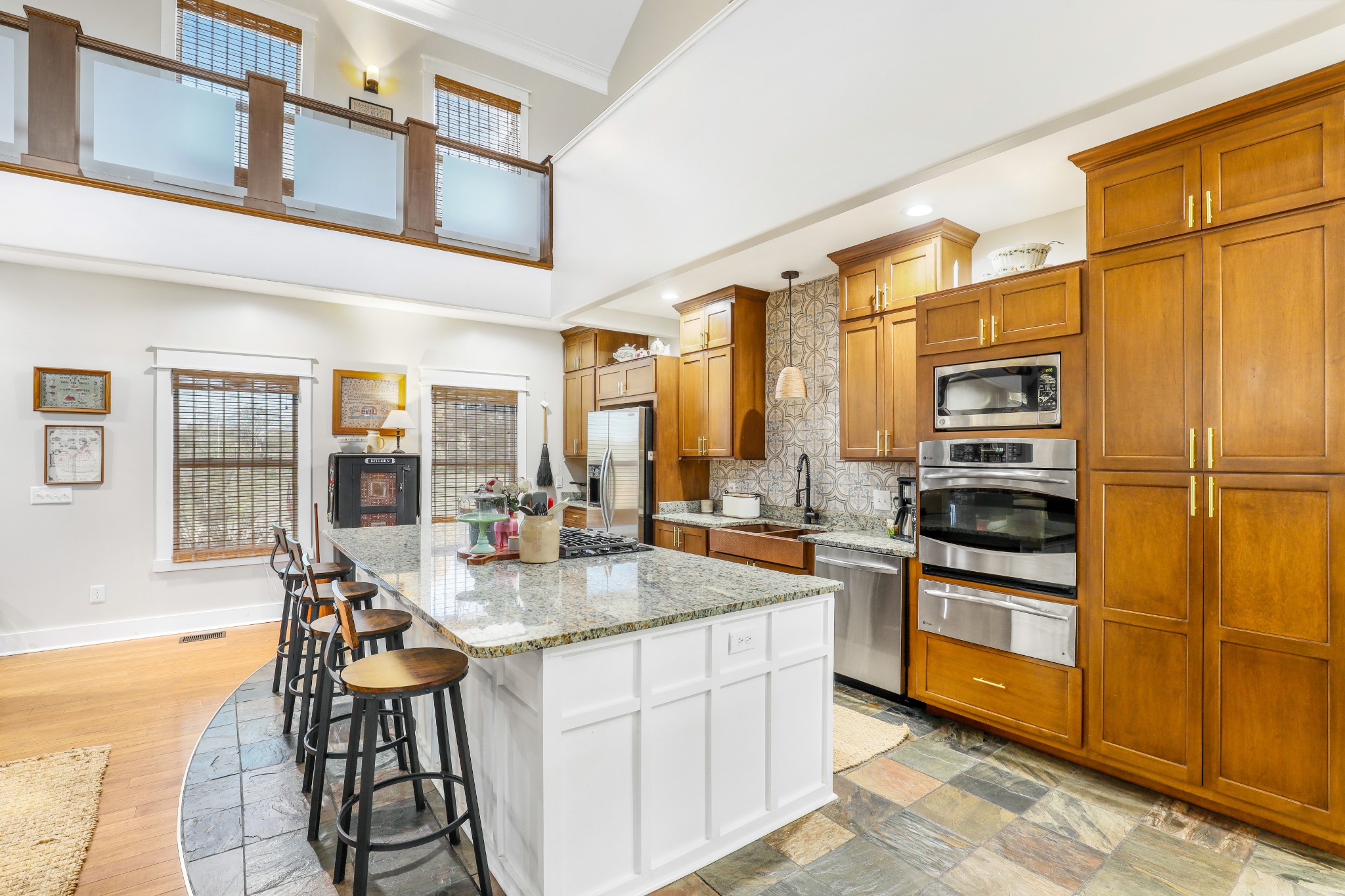 7518 Highway 49 Springfield, TN 37172 - Photo 10 of 35 a kitchen with stainless steel appliances granite countertop a stove and a refrigerator
